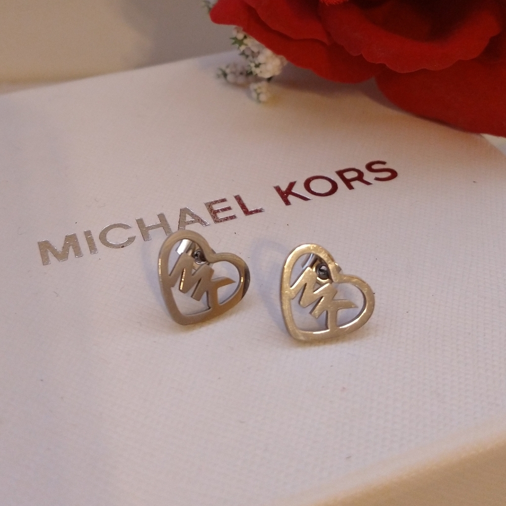 Mk silver stud earrings